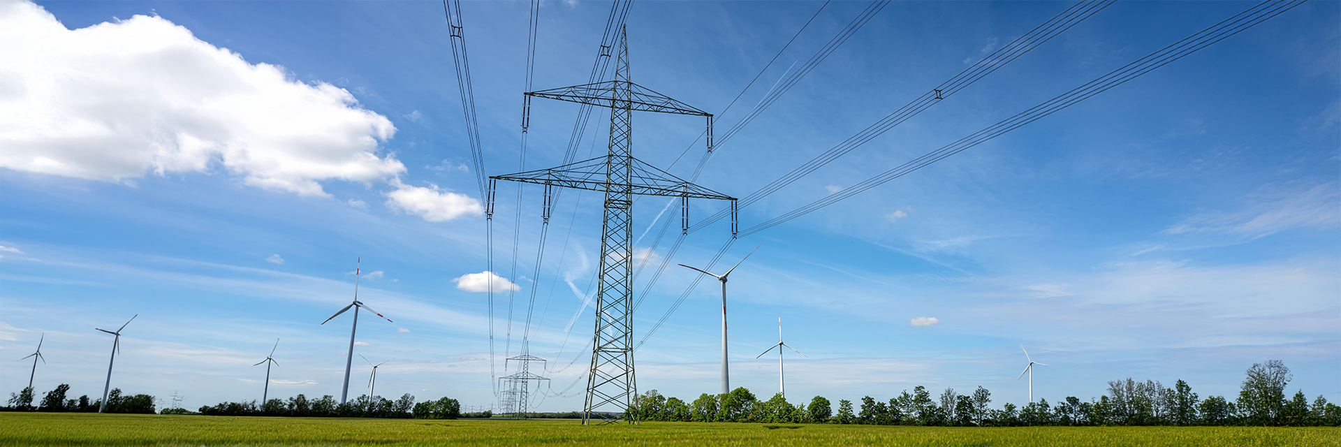 Header Electricity Pole & Wind Turbines
